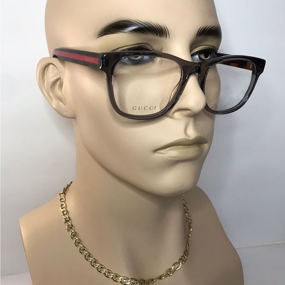 Gucci's GG0004ON soft lines across frames front.Iconic web effect optyl temples - Picture 1 of 14